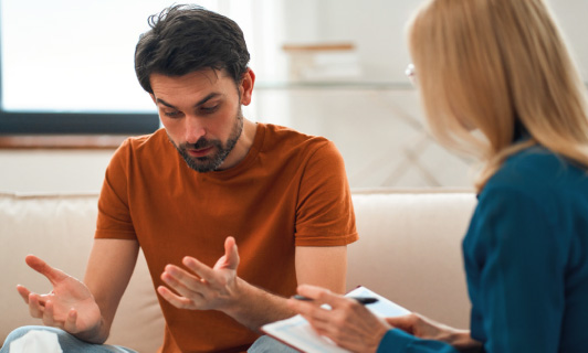 An adult in a therapy setting