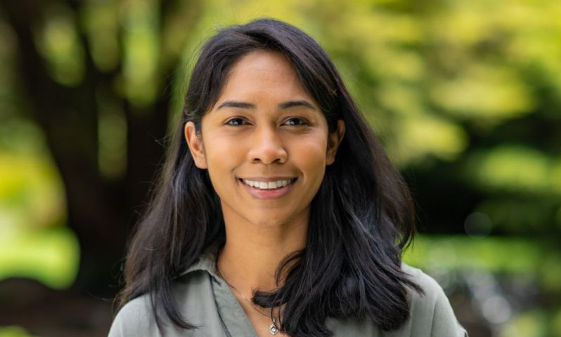 Dr Melanie Muniandy smiling for the camera