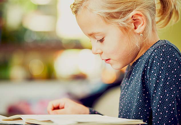 Child reading a book