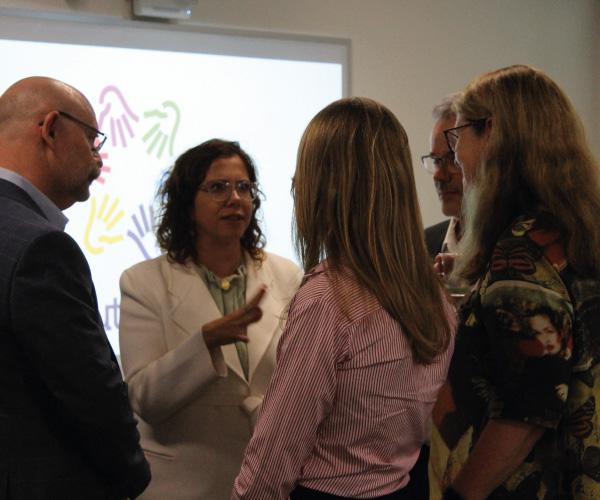 Amanda Rishworth chatting with some people after the speech ended.