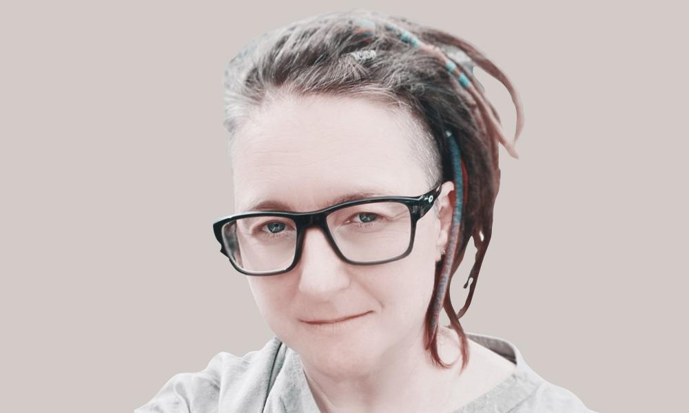 Photograph of Katharine Annear, showing head and shoulders, wearing professional atire.